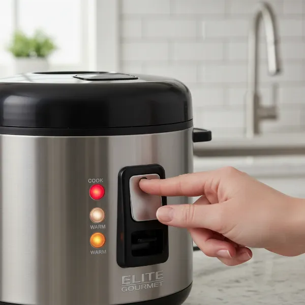 A hand operating the Elite Gourmet rice cooker's simple toggle switch for "COOK" and "WARM" settings